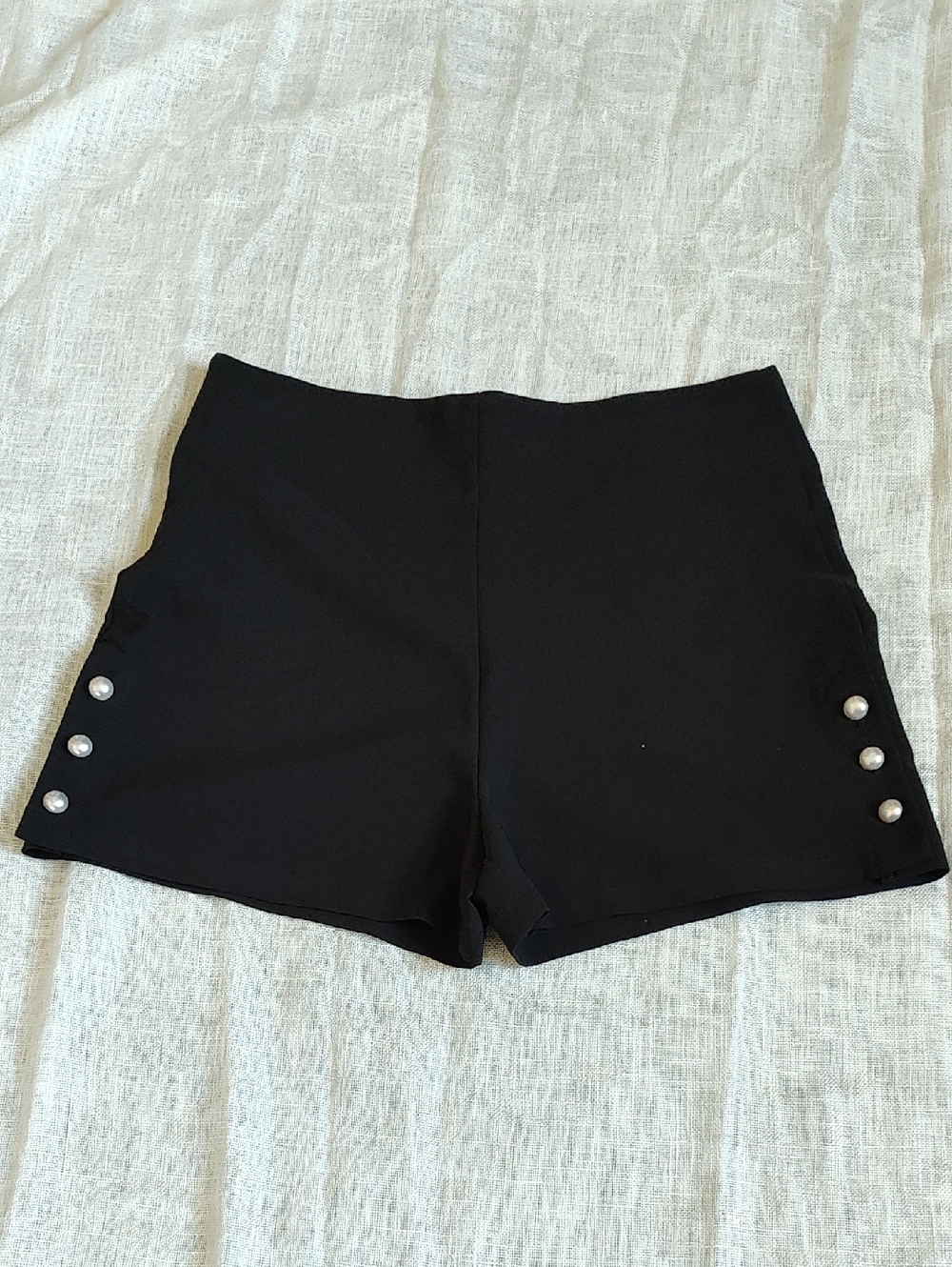 Have Black High-Waist Shorts with Pearl Buttons